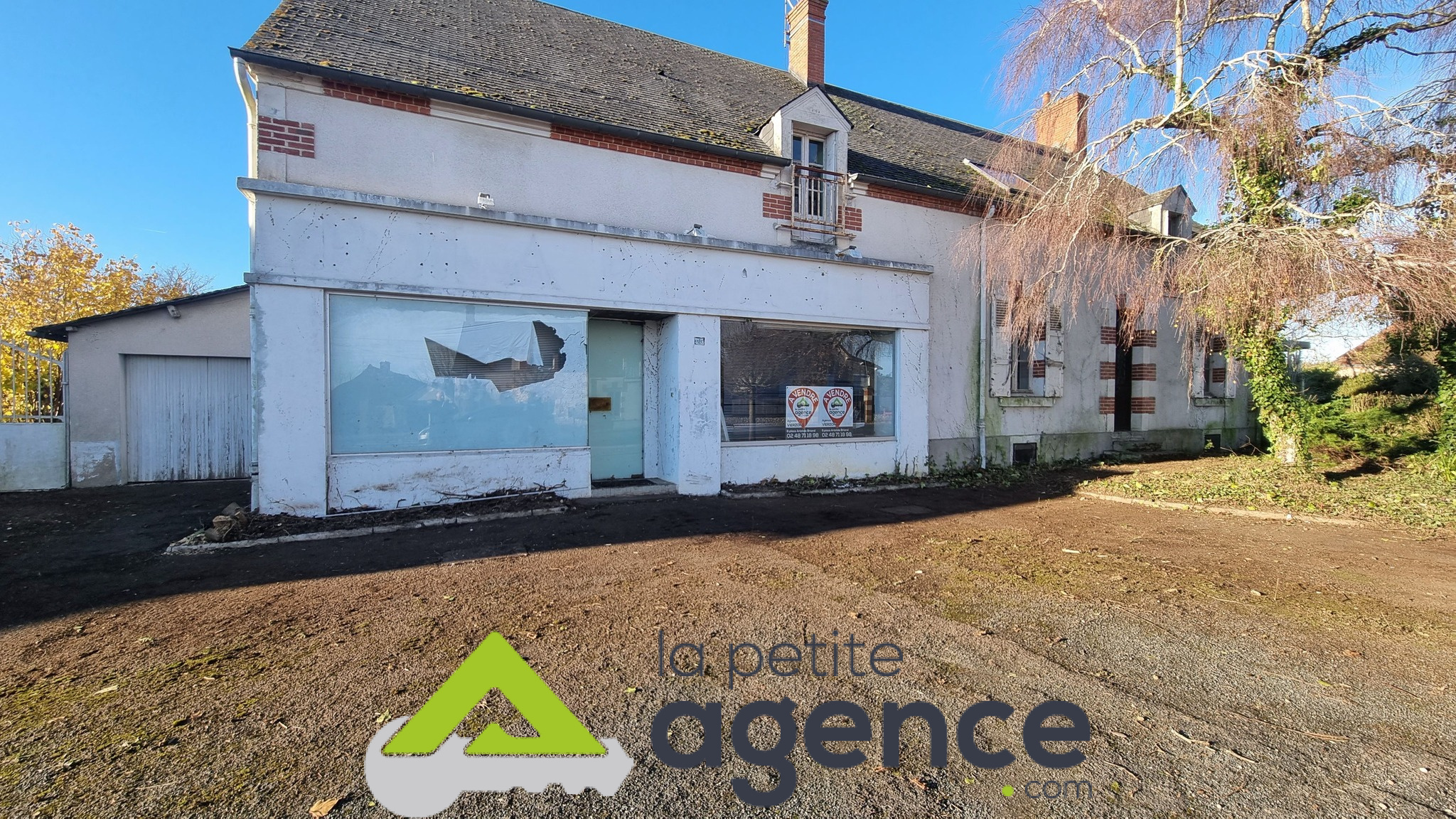 A vendre maison + local commercial + terrain constructible
